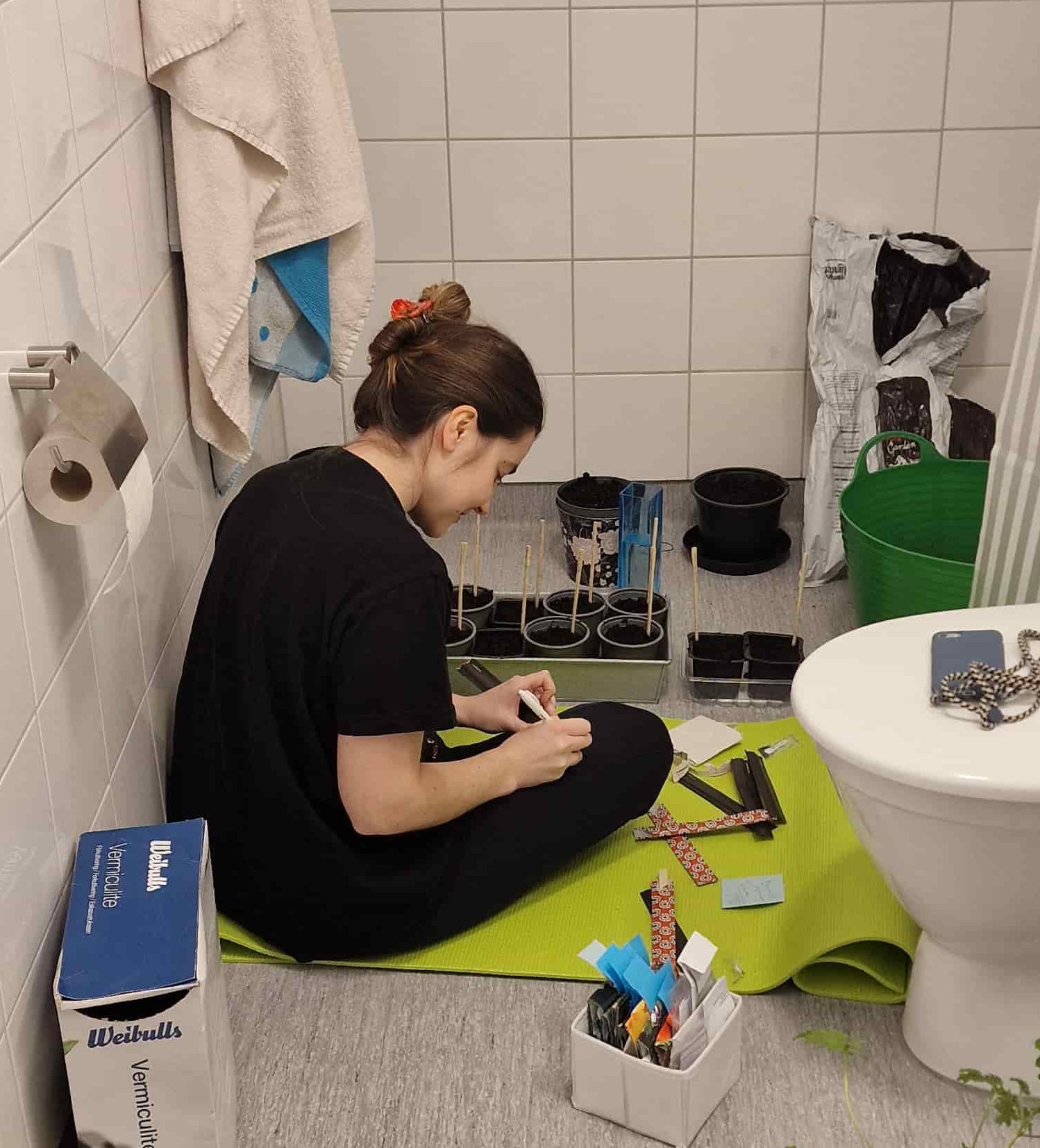 me starting seeds on the bathroom floor